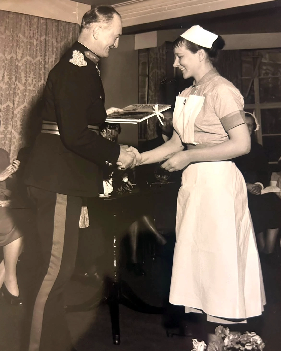 Meri receiving her nursing award